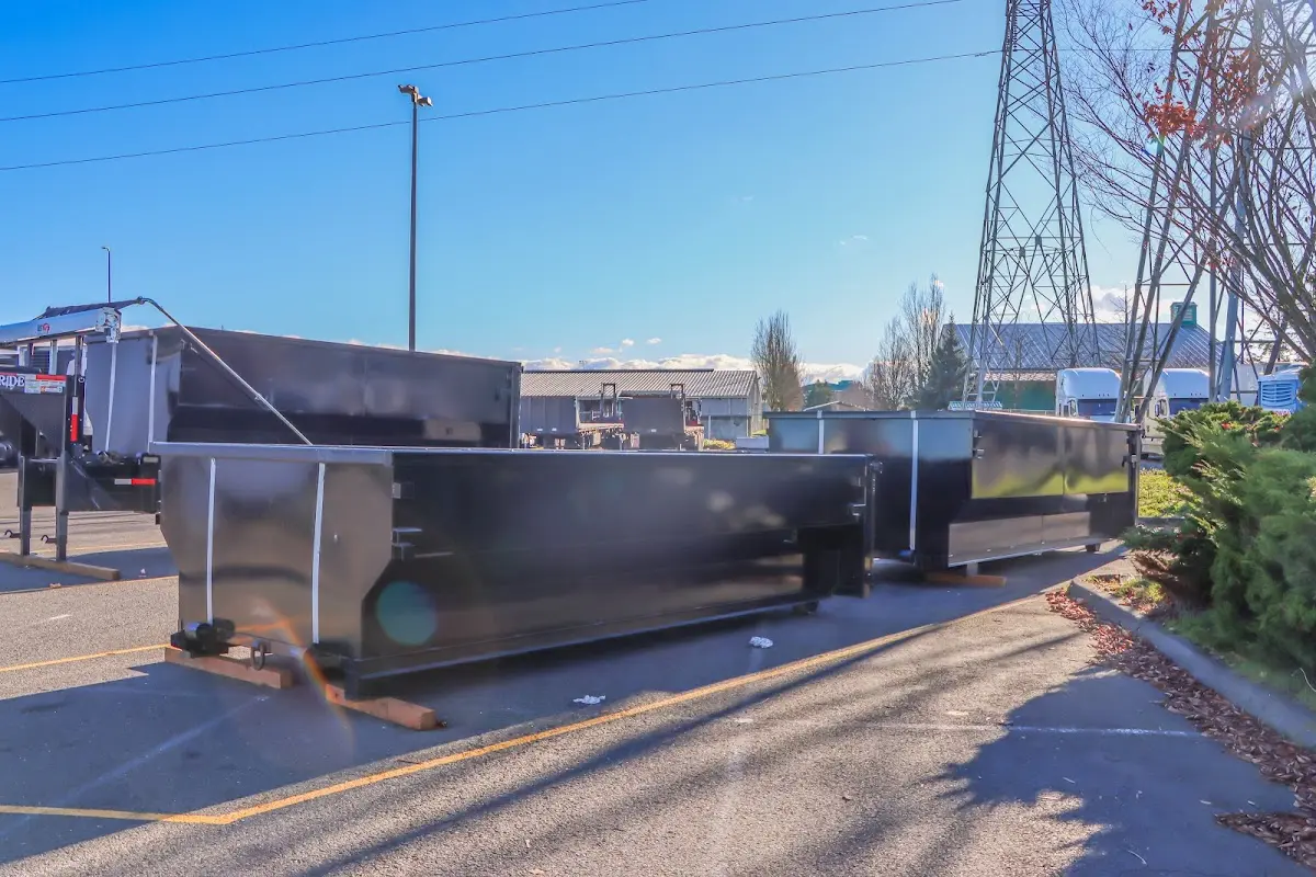 Roll-off dumpster ready for waste disposal at job site for Yard Waste Dumpster Rental in Denham Springs